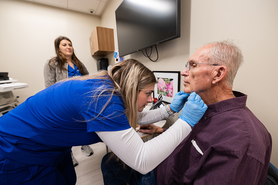 Speech-Language Pathology student providing patient care