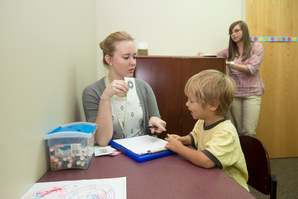 Working with pediatric client at the Clinic